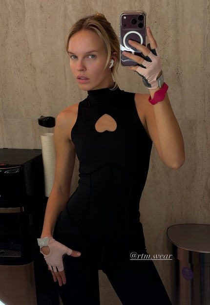 Iconic<em> @anasstart</em> wearing <a href="/en/products/cupids-wife-jumpsuit" title="Cupid's Wife Jumpsuit"><strong>CUPID'S WIFE MIXED</strong></a>